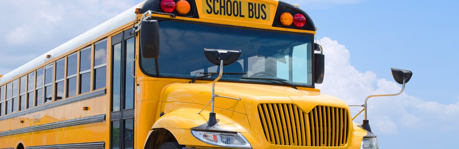 close up image of school bus front